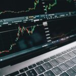 Close-up of a financial graph on a laptop screen, depicting stock market analysis in Berlin.